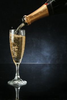 Pouring a champagne flute for celebration time