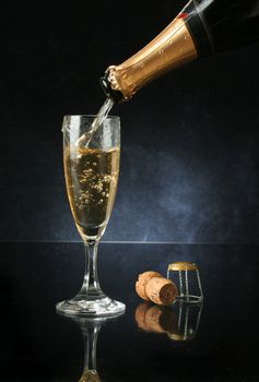 Pouring a champagne flute for celebration time