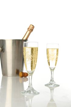 Champagne flutes and ice bucket, festive combo.