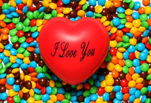 Colorful candy background with a red heart from my Valentine series