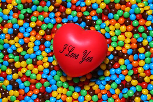 Colorful candy background with a red heart from my Valentine series