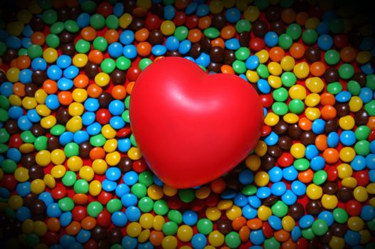 Colorful candy background with a red heart from my Valentine series