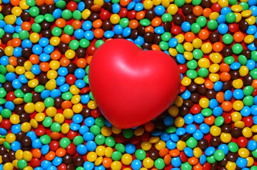 Colorful candy background with a red heart from my Valentine series