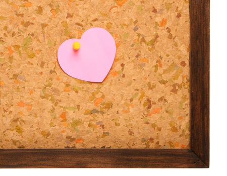 Cork board with heart shape sticky note