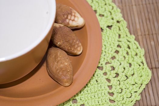 Take a break for huge cup of coffee with milk and treats!