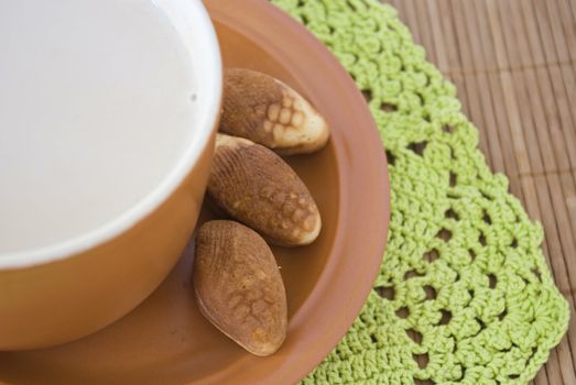 Take a break for huge cup of coffee with milk and treats!