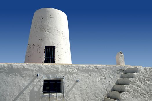 Balearic islands architecture white mill in Formentera over blue sky