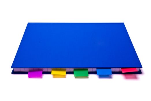 Blue notepad with colorfull bookmarks on white background