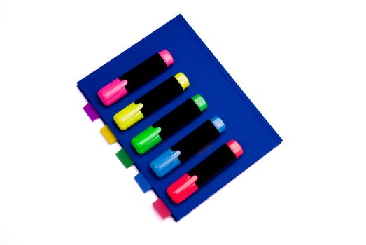 Blue notepad with colorfull bookmarks on white background