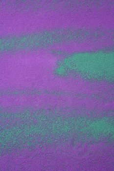 colorful pigments background textures in green and purple salt sand