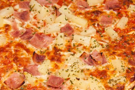 Closeup picture of hawaii pizza