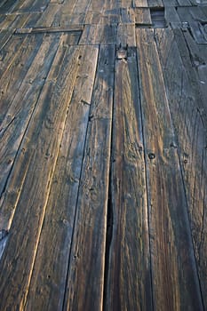 Close up of wooden planks of a jetty/quay