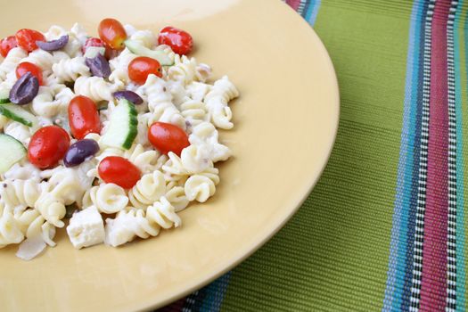 Cold Pasta Salad with tomatoes, cucumbers and olives