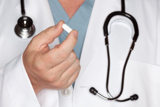 Male Doctor Abstract with Stethoscope and Pill -  Narrow Depth of Field.