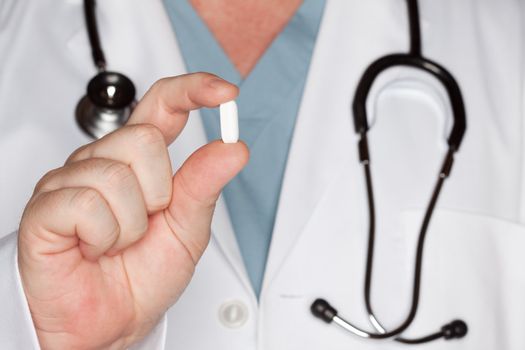 Male Doctor Abstract with Stethoscope and Pill -  Narrow Depth of Field.