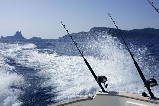 Fishing big game on Mediterranean sea boat with rod and reel