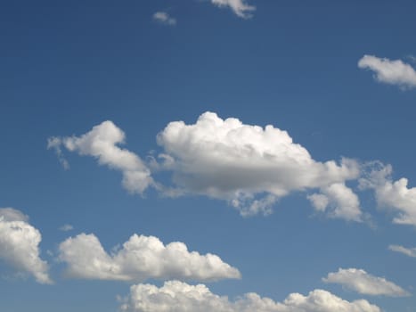 Blue sky with white clouds useful as a background