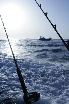 Fishing big game on Mediterranean sea boat with rod and reel