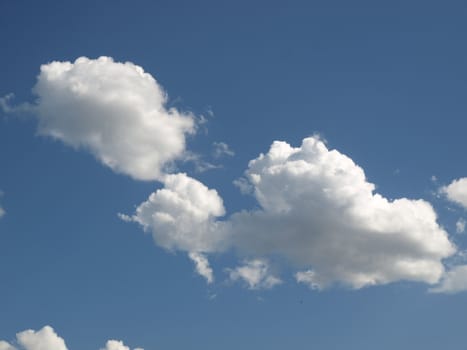 Blue sky with white clouds useful as a background