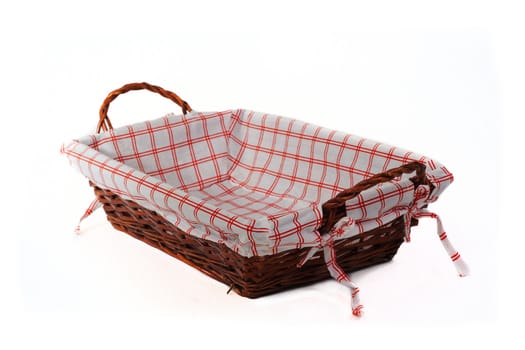 Cane bread basket at angle isolated over white made in cane, with internal clothe