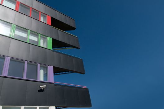 A corporate building against the blue sky