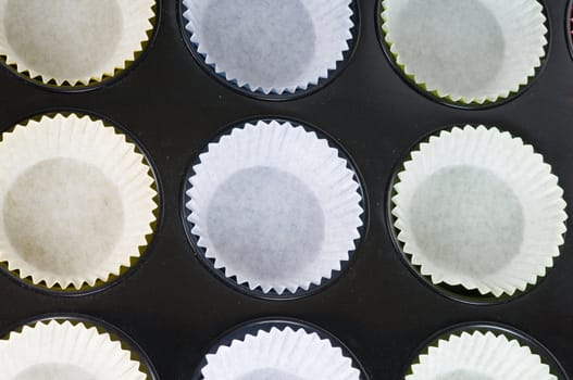 Prepering cup-cakes on the cake pan