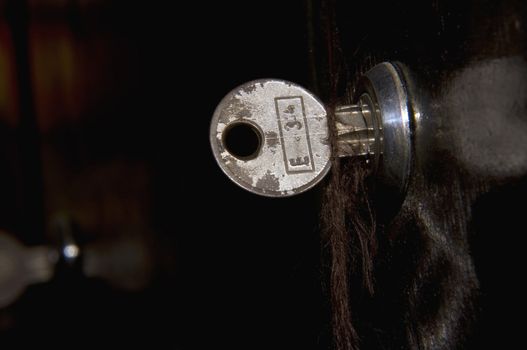keys in a metal locker, glossy and  dark