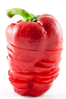 Picture of a sliced standing paprika on a white background