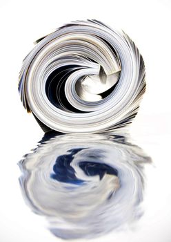 rolled up magazine with reflection