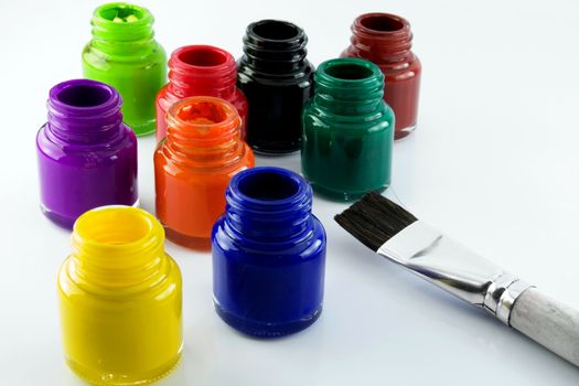 lots of glass paint pots 