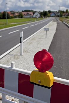 road block on a sunny day