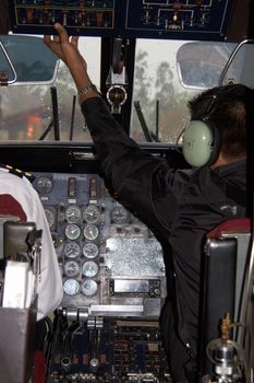Cockpit of small propeller Dornier-228 aircraft used at Kathmandu - Lukla flights in Nepal. It is the popular mean to reach the start point of Everest trek.