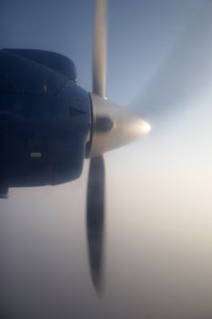 Rotating propeller of a small Dornier-228 aircraft used at Kathmandu - Lukla flights in Nepal. It is the popular mean to reach the start point of Everest trek.