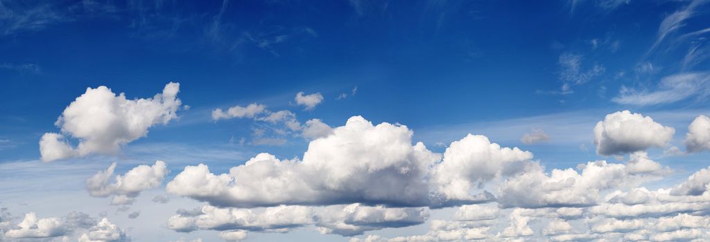 Cloudy blue summer sky - wide panorama