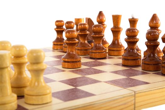 Chess wooden board with figures on the white background