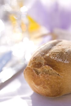 fresh bread on the table in the sun