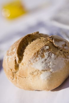 fresh bread on the table in the sun