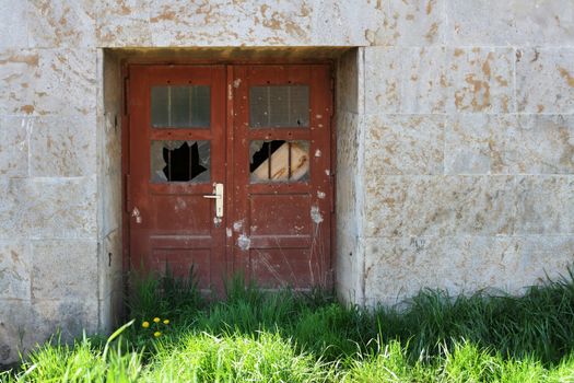 entrance with door handle of an old wooden house