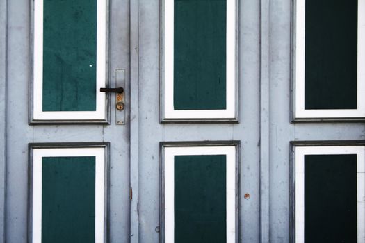 entrance with door handle of an old ware house