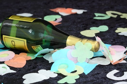 champange bottle and confetti