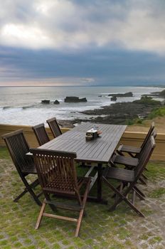 Outdoor furniture, with table, chairs and sea view