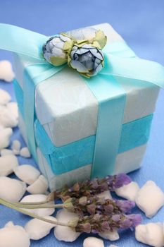 Soap gifts in wrapped in blue with white bath crystals