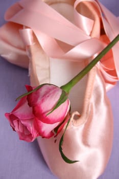 Satin Ballet shoe with a pink rose