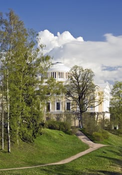 Classical palace amongst spring trees