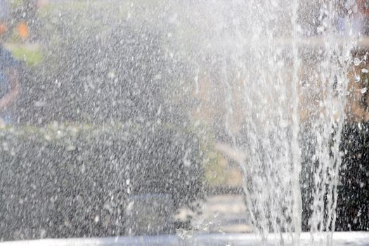 close up of water spraying out of a fountain
