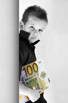 Little Child holding 100 Euro in the hands