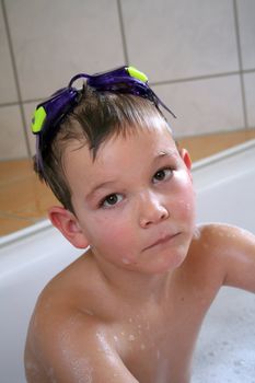 a Child is playing in the bathtub