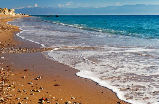 Long and inviting sandy beach in the Mediterranean without people