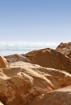 Rocks in the foreground, horizon in the background