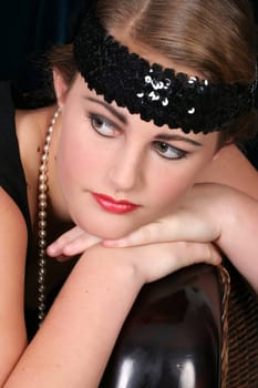 Beautiful young female in 1920 style attire
